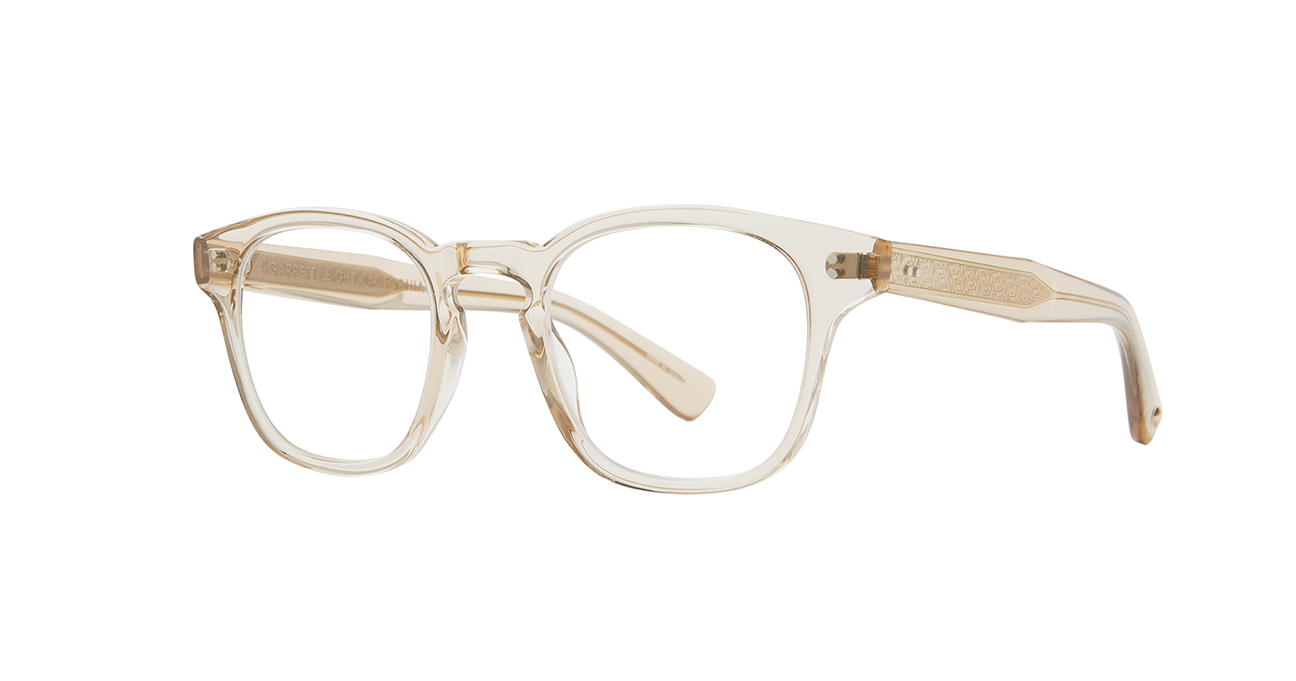 the cult-favorite Ace Sun transformed into an optical. Ace II reflects the standard way in which we design and create premium eyewear. We’re not reinventing the wheel here – just putting some rims on ‘em. In a color we call brew, a translucent frame with a light hue of amber/brown. This image shows the sideview.