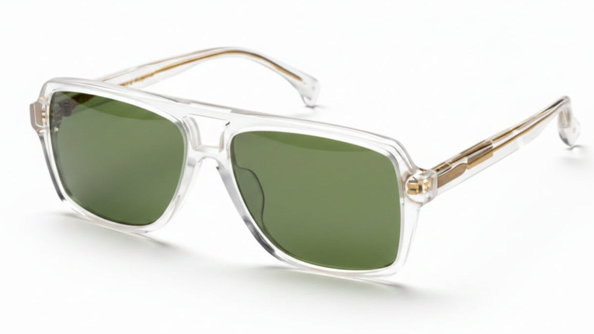 Clear sunglasses with gold frames on a white background. Green polarized lenses