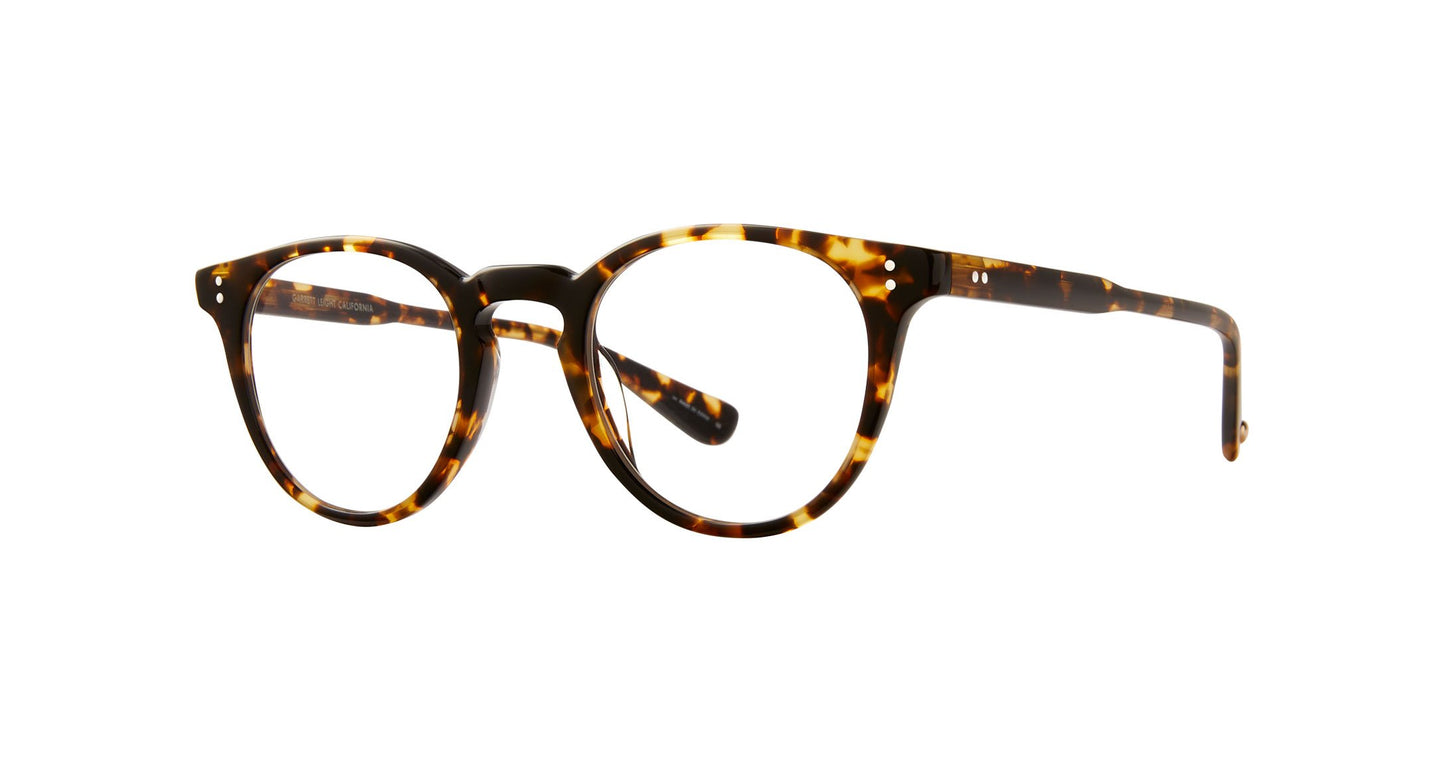 A bold silhouette and minimal hardware make the Clement Tuscan Tortoise striking in its simplicity. Thoughtfully pared back with a new temple design, these eyeglasses evoke the spirit of Andy Warhol. Handcrafted in California. 