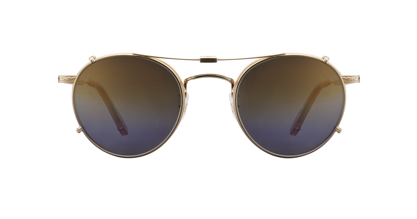 A gold Garrett Leight stainless steel folding sun clip with mirror lenses, designed to attach to Wilson eyeglasses, displayed against a plain background.