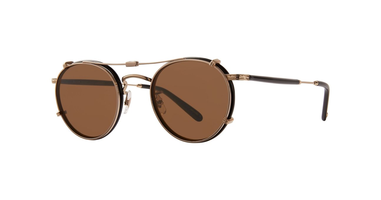 Side view of a bronze Garrett Leight stainless steel folding sun clip with brown tinted lenses, designed to attach to Wilson eyeglasses, displayed against a plain background.