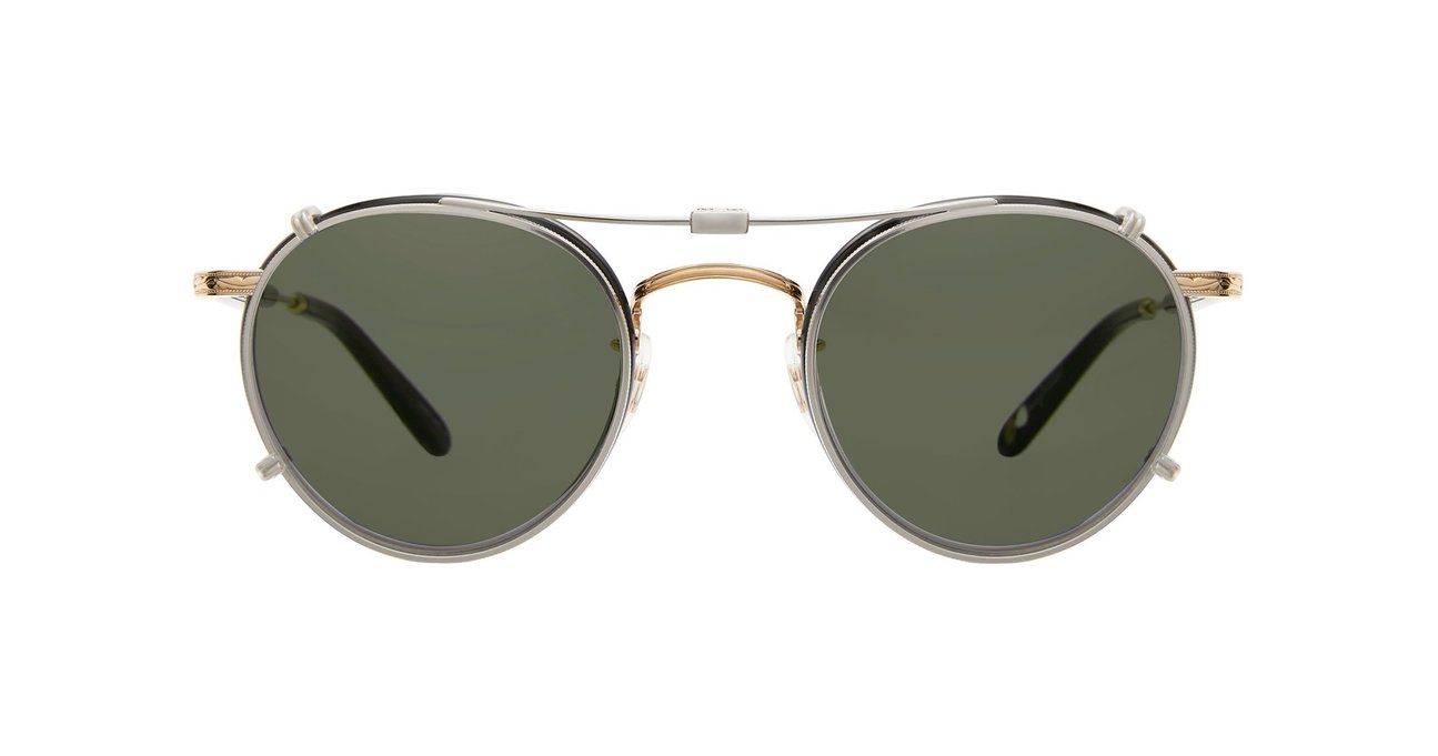 A silver Garrett Leight stainless steel folding sun clip with green tinted lenses, designed to attach to Wilson eyeglasses, displayed against a plain background.