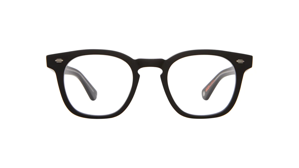 A pair of square-shaped, vintage-style eyeglasses with a tortoise patterned frame.