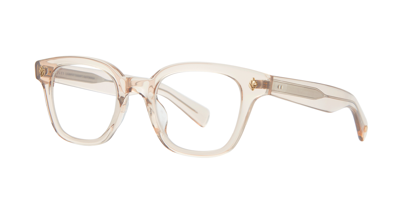 With rich materials and a bold silhouette, the Naples Bio Beige eyeglass frame infuses a modern design with vintage sensibility. Palm leaf plaques embellish the exaggerated end pieces for a look that's equal parts minimal and striking. Select colorways are crafted from the new bio-based acetate. Hand Finished in LA. 